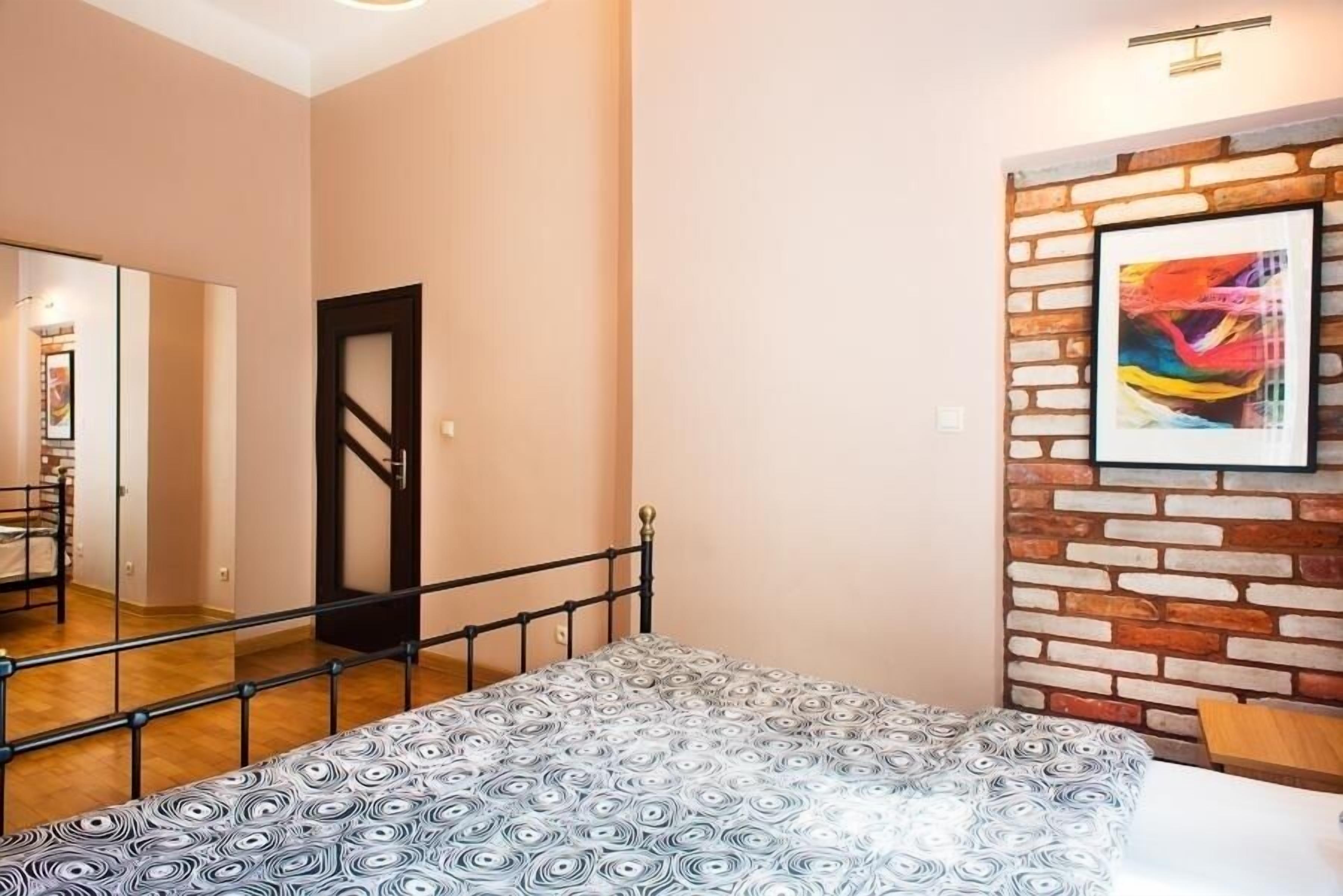 comfort apartment, courtyard view | hypo-allergenic bedding, laptop workspace, iron/ironing board