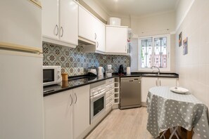 Apartment, 2 Bedrooms, Balcony, Sea View | Private kitchen | Full-size fridge, microwave, oven, stovetop - Atlantic Ocean Apartment (Funchal)