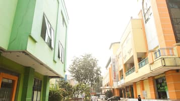 A street view with buildings, including a bank and a restaurant.