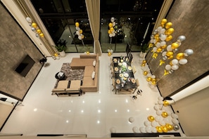 Duplex Suite | Living area | 49-inch LCD TV with digital channels, TV - Luxcity Hotel & Apartment (Phnom Penh)