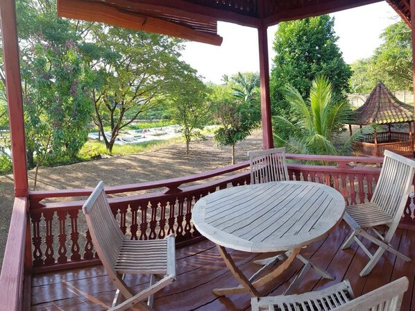 House, 3 Bedrooms | Terrace/patio - T-Rooms Homestay Bandara (Palembang)