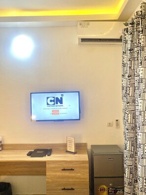 Rideaux occultants, fer et planche à repasser, Wi-Fi gratuit