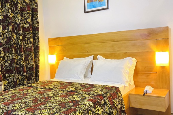 Deluxe Double Room | Blackout drapes, iron/ironing board, free WiFi, bed sheets