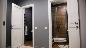 Shower, rainfall showerhead, towels