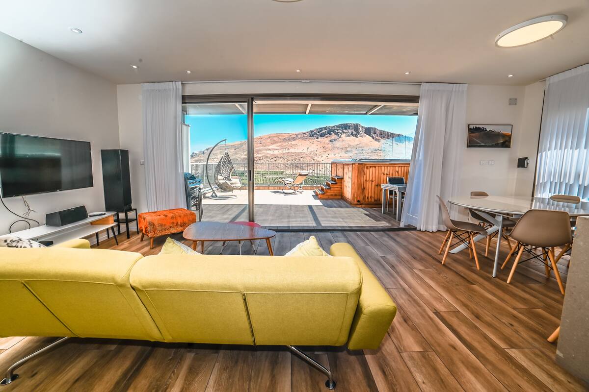 Premium Suite, 2 Bedrooms, Lake View | Living room | Flat-screen TV