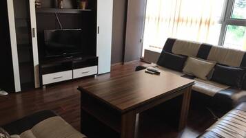 Apartment, 1 Bedroom | Living area | TV