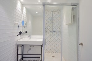 Apartment, 1 Bedroom | Bathroom | Shower, rainfall showerhead, eco-friendly toiletries, hair dryer
