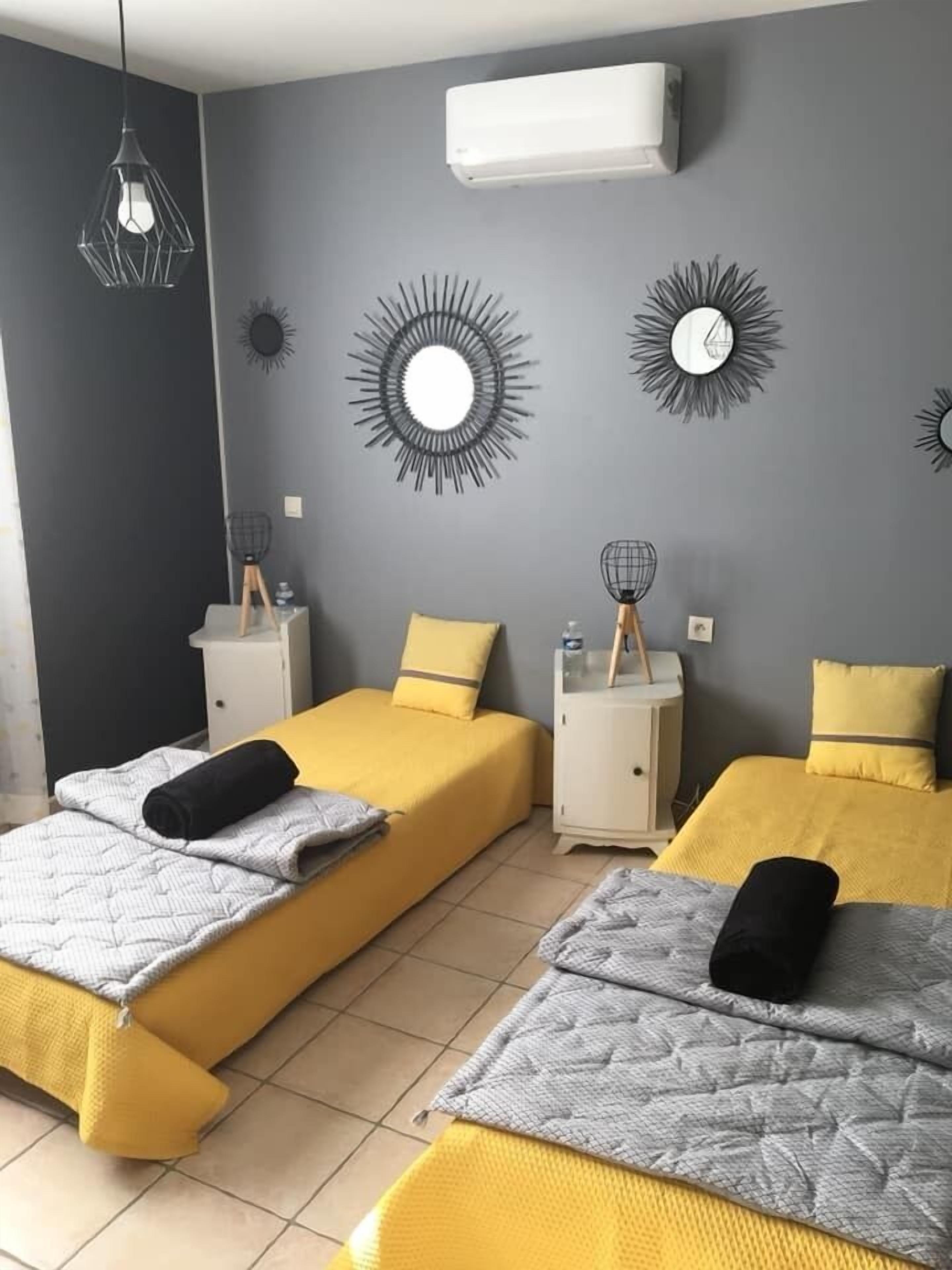 Quadruple Room, 2 Bedrooms (private external bathroom) | Dihias secara berasingan, dilengkapkan perabot secara berasingan 