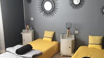 Quadruple Room, 2 Bedrooms (private external bathroom) | Dihias secara berasingan, dilengkapkan perabot secara berasingan