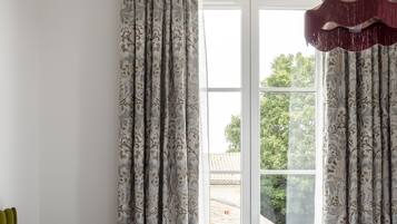 Premium bedding, in-room safe, individually decorated