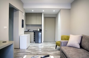 Appartement | Coin séjour | Télévision à écran plat de 55 pouces avec chaînes par satellite
