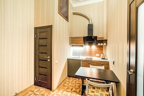 Apartment (1) | Private kitchen | Fridge, microwave, stovetop, electric kettle - Apartments Daniel (Odesa)