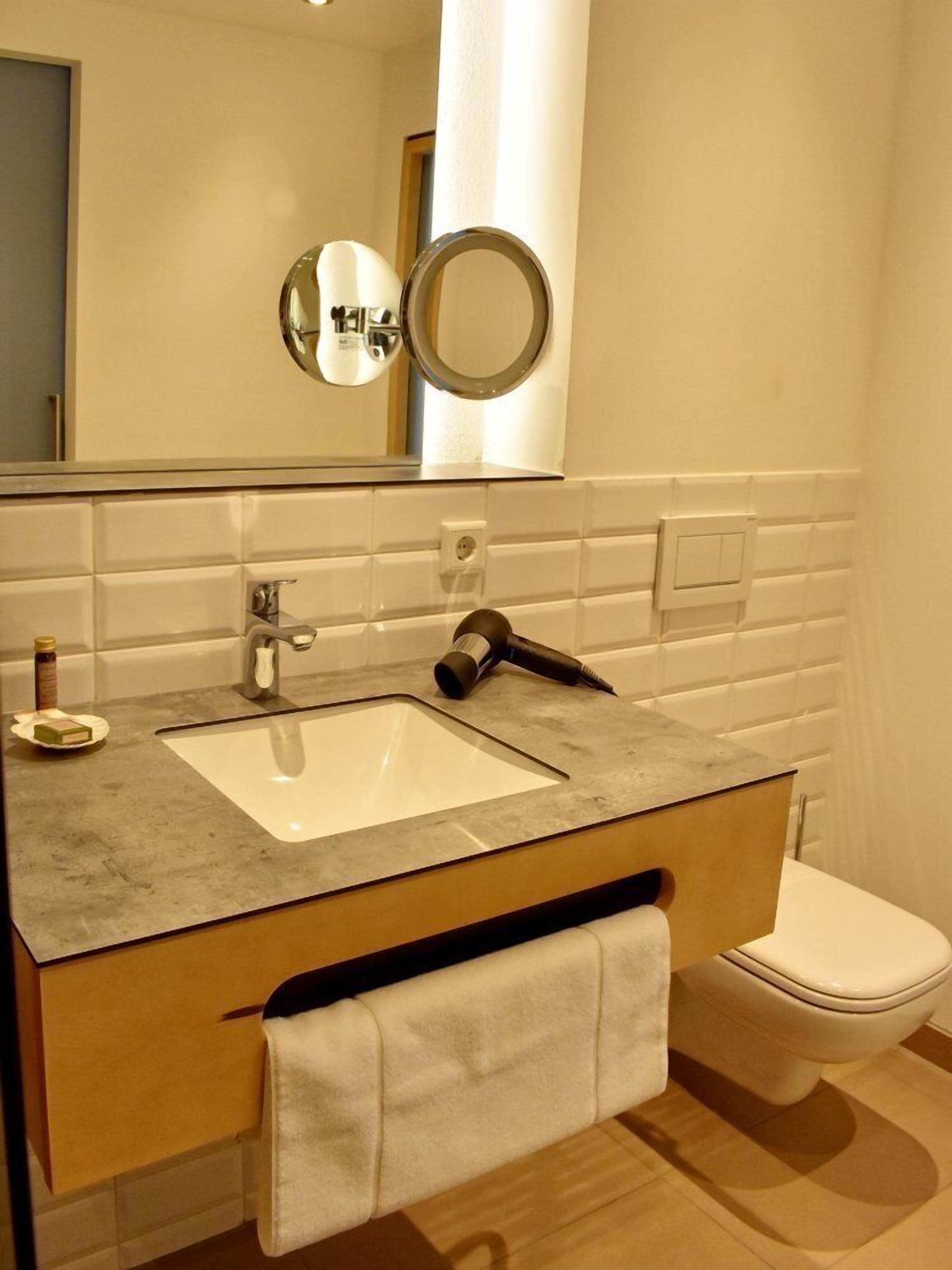 shower, rainfall showerhead, towels, soap