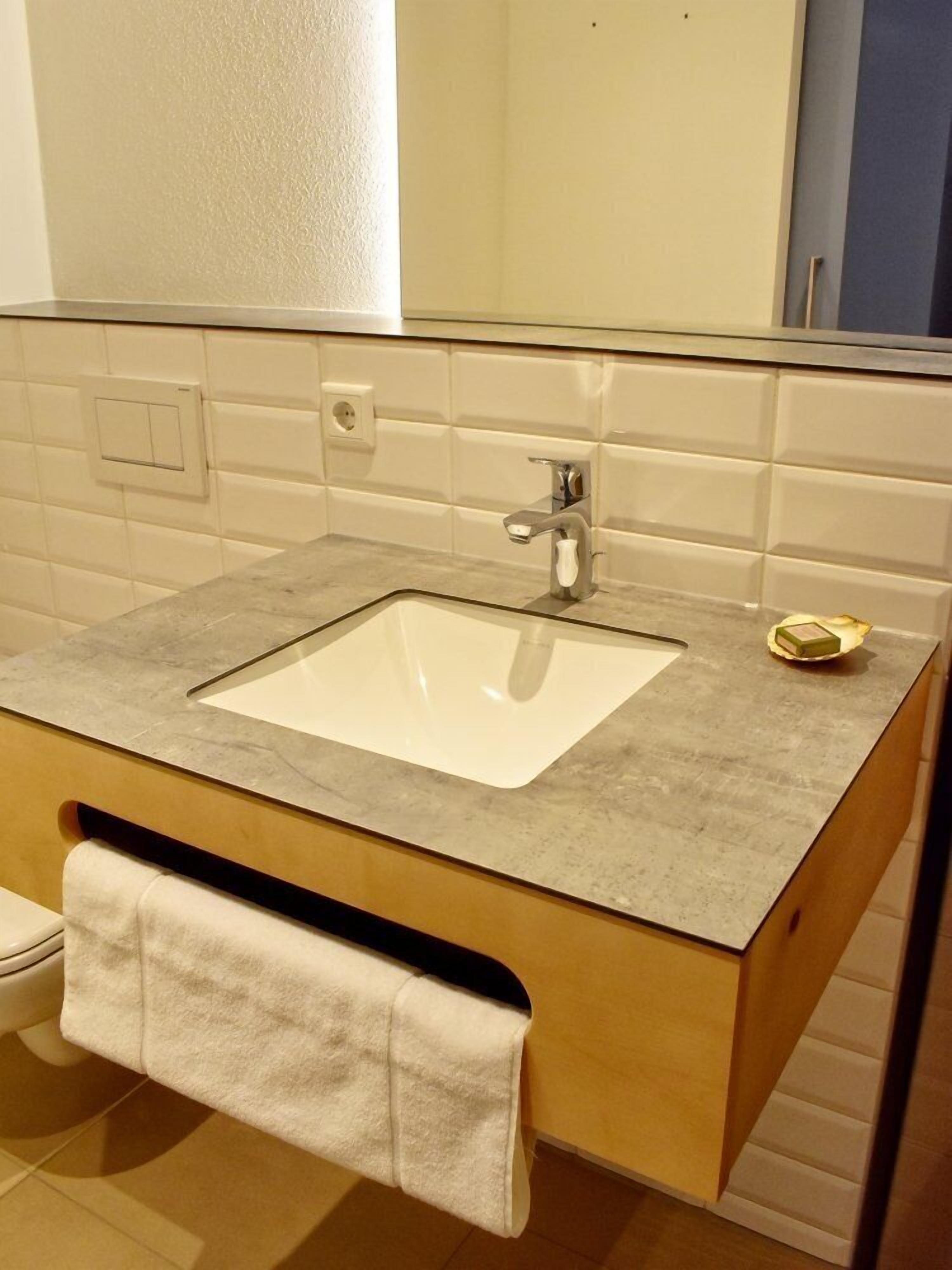 shower, rainfall showerhead, towels, soap