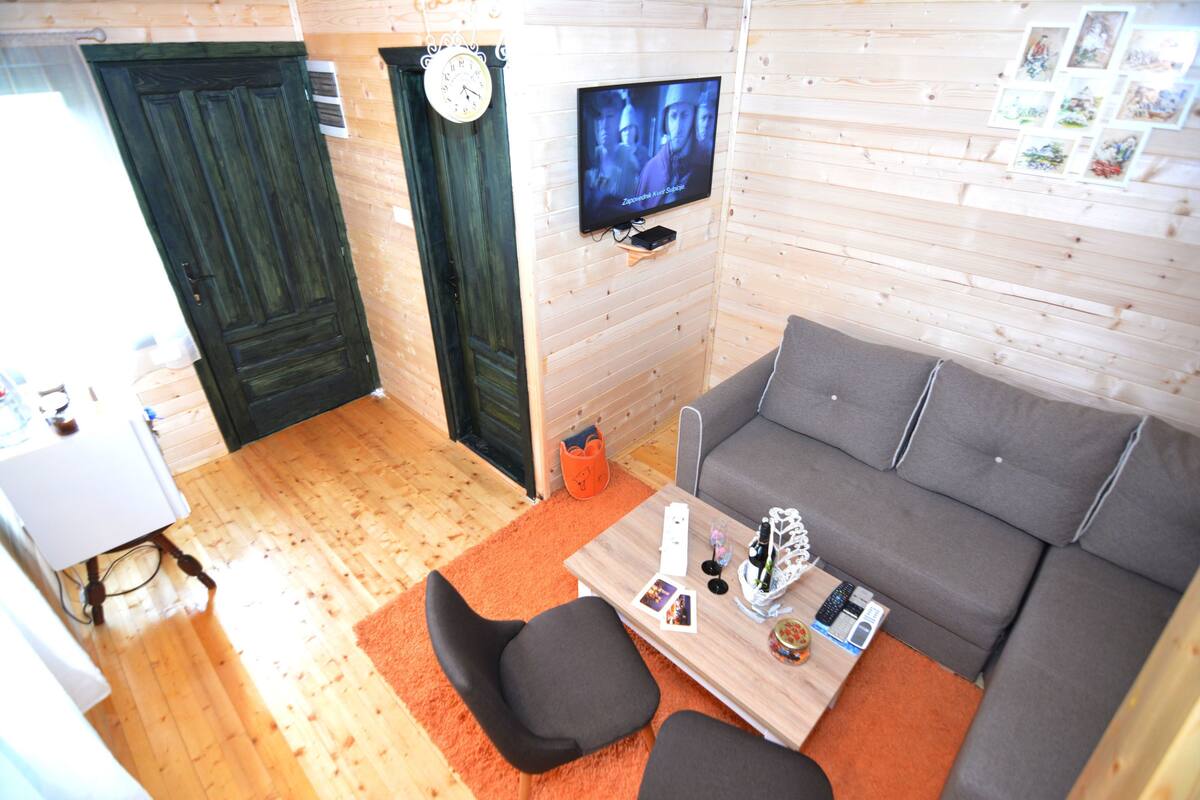 Bungalou destacat | Sala d'estar | Televisor de pantalla plana