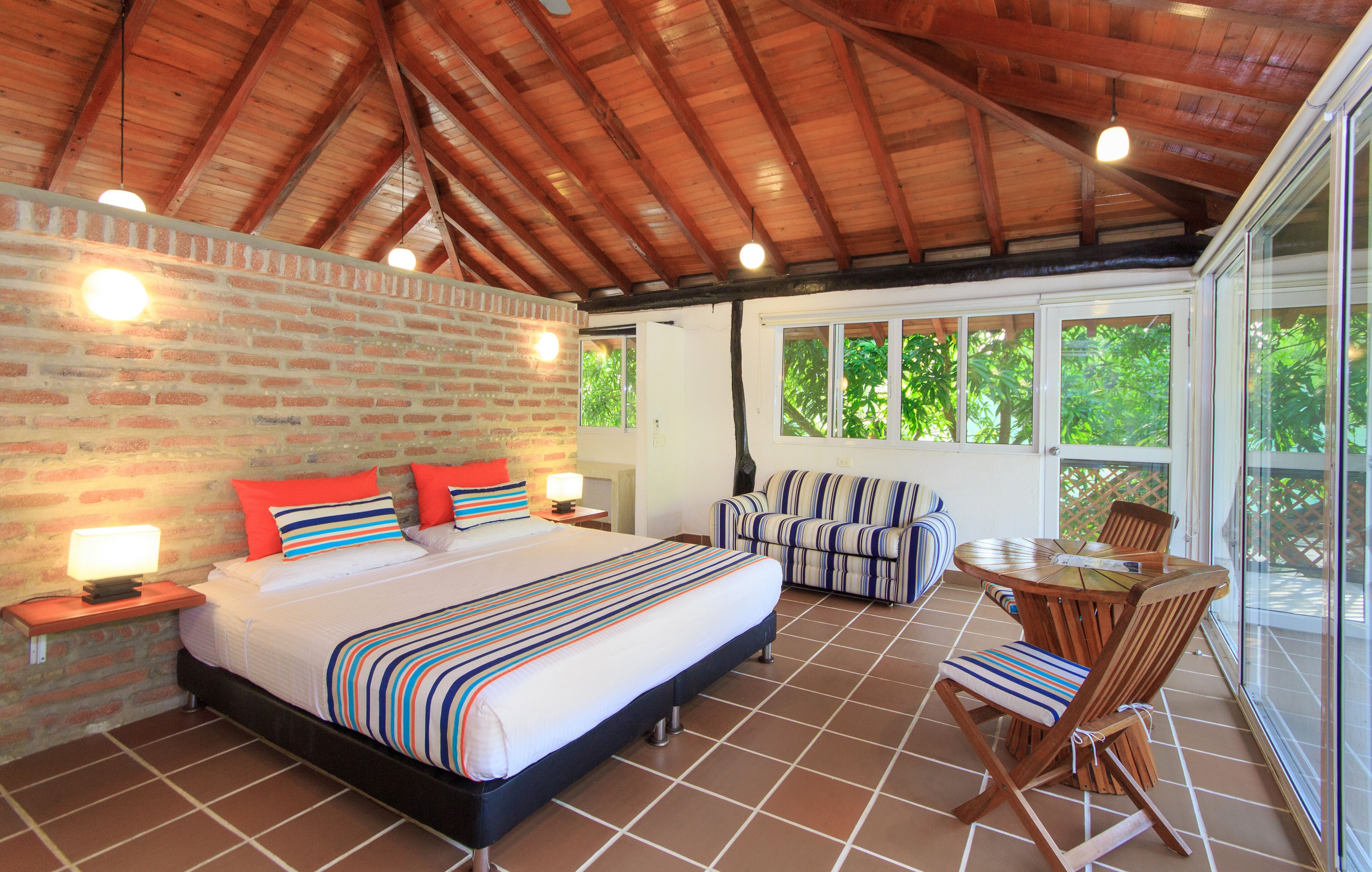 suite, multiple beds, balcony | 1 bedroom, in-room safe, free wifi, bed sheets