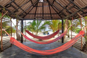 On the beach, free beach cabanas, beach umbrellas, beach towels