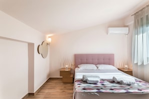 Premium bedding, memory-foam beds, in-room safe, individually decorated