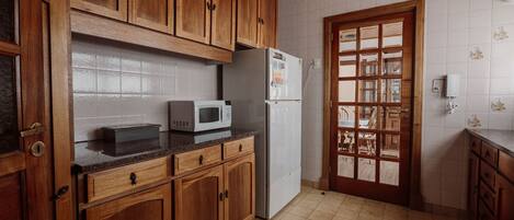 Apartment | Private kitchen | Fridge, microwave, oven, stovetop