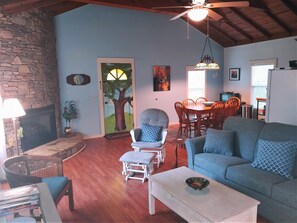 Deluxe Cottage (Pet Friendly) | Living area | 32-inch LED TV with satellite channels, TV - McKinley Edwards Inn (Bryson City)