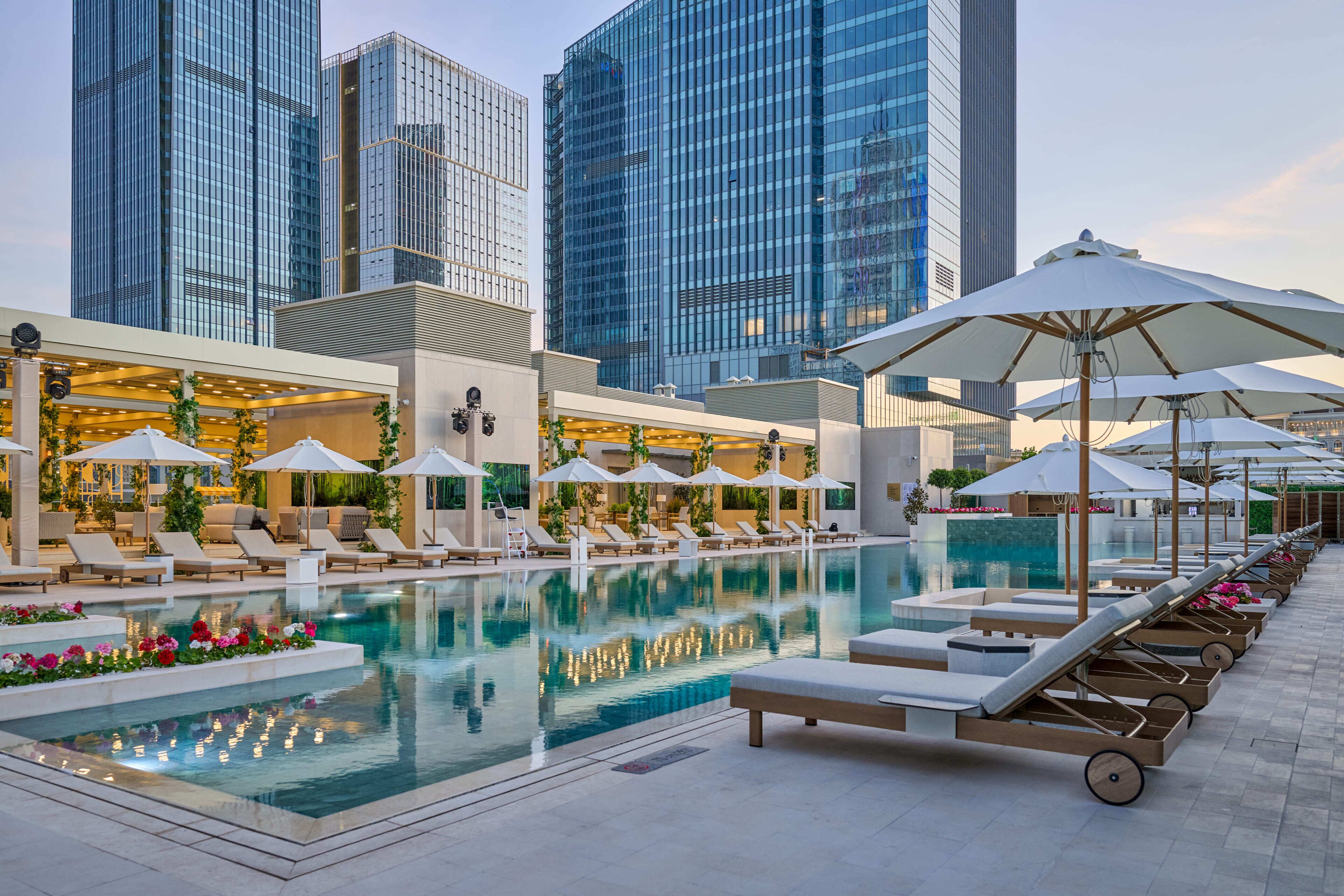 Indoor pool, seasonal outdoor pool, pool umbrellas, pool loungers