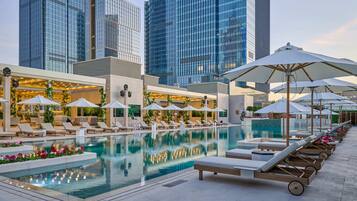 Indoor pool, seasonal outdoor pool, pool umbrellas, pool loungers