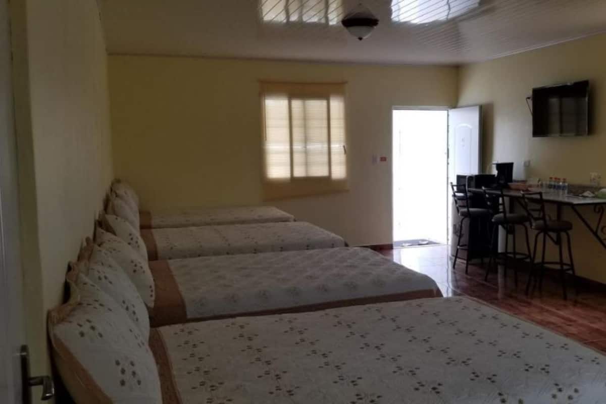 Family Quadruple Room | Laptop workspace, soundproofing, WiFi (free), bed sheets