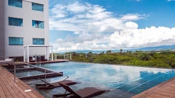 Outdoor pool, open 6:00 AM to 8:00 PM, sun loungers