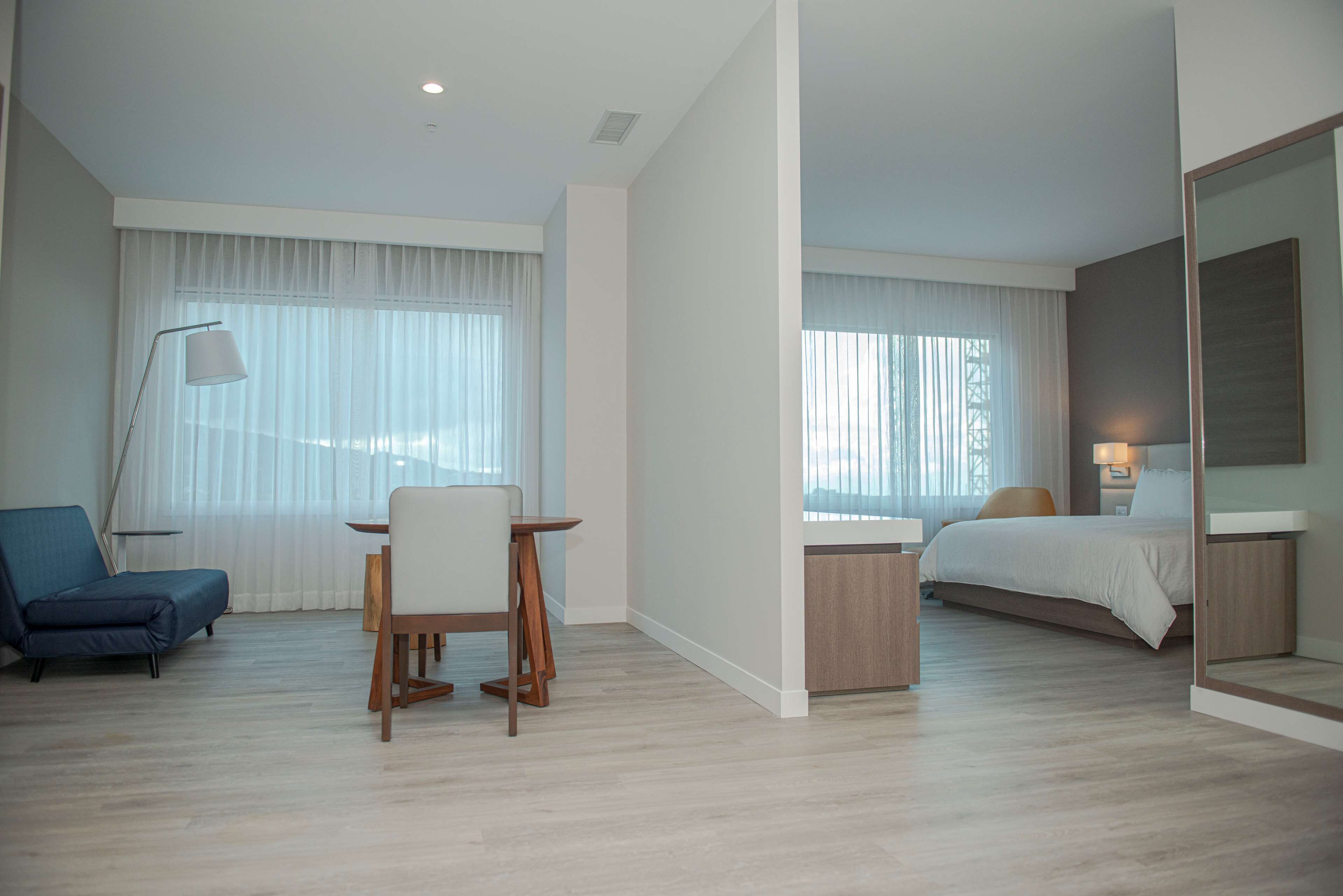 suite, 1 bedroom, accessible (roll-in shower) | living area | 50-inch flat-screen tv with cable channels, tv, heated floors