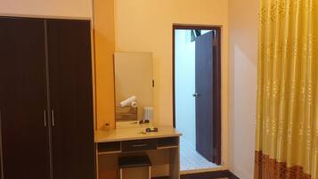 Deluxe Double Room | Living area | TV