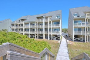 Exterior - Oceanfront OIBV 1001 in Caswell Beach, a spacious 3-bedroom condo ideal for 8. (Caswell Beach)