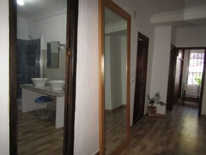 Bathtub, hair dryer, bidet, towels