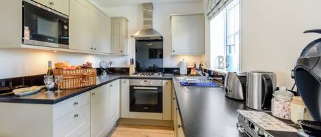 Astianpesukone, syöttötuoli