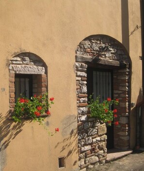 Exterior detail - Typical apartment in ancient village near the sea-coast of the Etruscans (Sassetta)