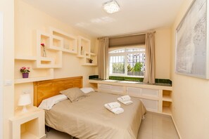 1 dormitori, planxa i posts de planxar, wifi gratuïta i roba de llit