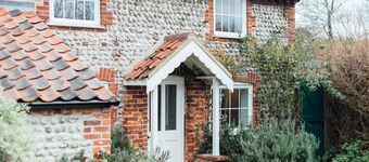 Charming detached flint cottage on village green, 5 minute stroll to beach