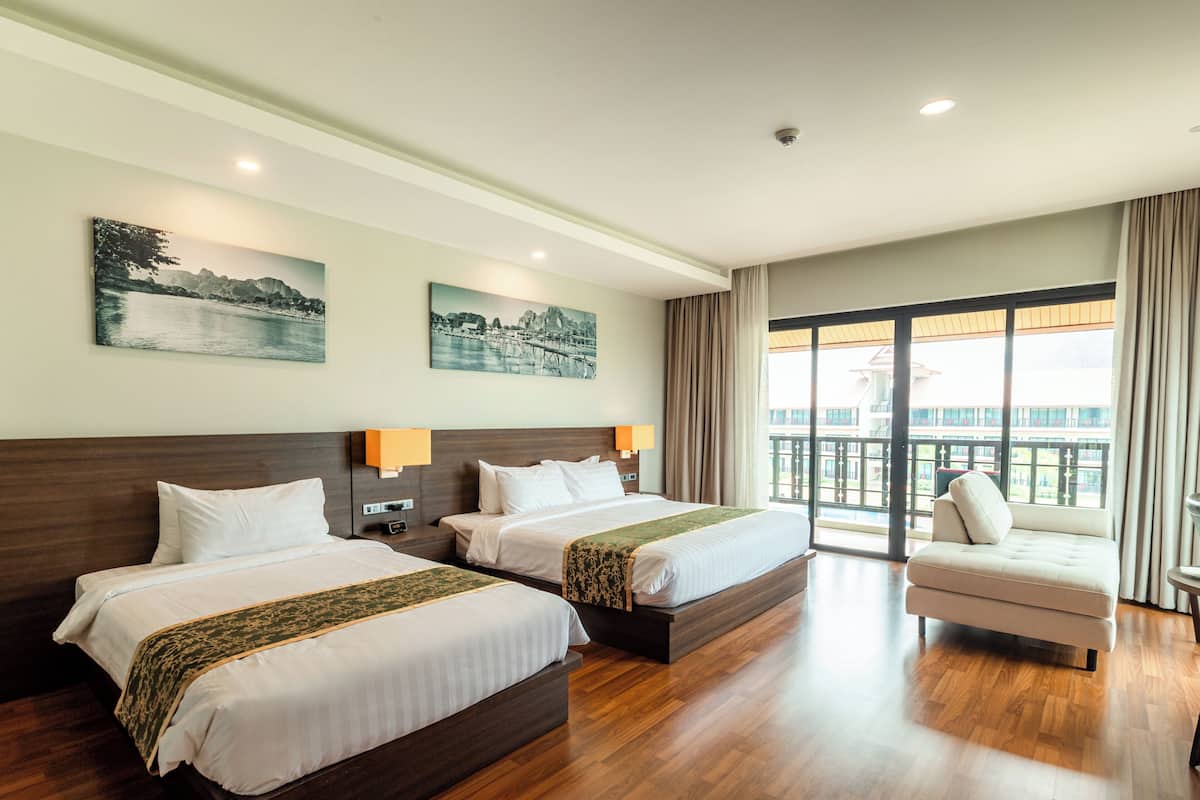 Family Triple Room | Minibar, in-room safe, individually furnished, desk