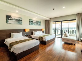 Family Triple Room | Minibar, in-room safe, individually furnished, desk