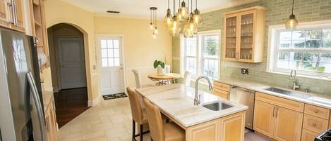 Microwave, dishwasher, coffee/tea maker, cookware/dishes/utensils