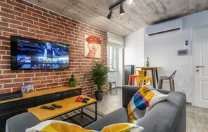 Televisión de pantalla plana, videojuegos, Netflix, reproductor de DVD