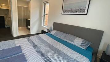 4 bedrooms, desk, iron/ironing board, travel cot