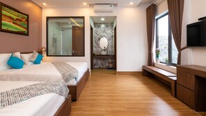 A modern hotel room with two beds, a TV, a large window, and a shower area. - Seaweed Luxury Villa&Spa (Da Nang)