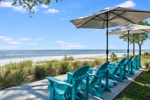 On the beach, sun loungers, beach towels