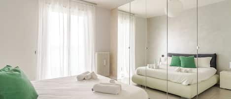2 habitaciones, tabla de planchar con plancha, cuna de viaje y wifi