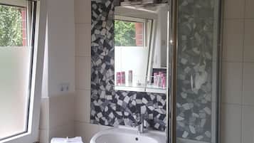 Shower, free toiletries, hair dryer, towels