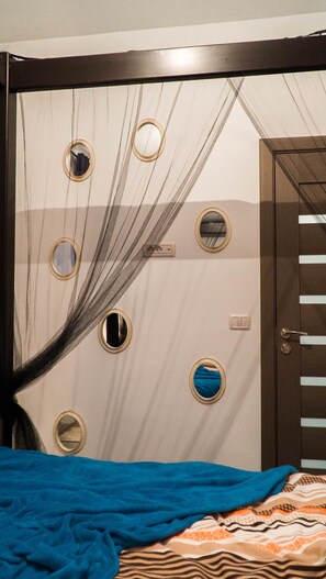 1 غرفة نوم ومكواة/لوح كي وواي فاي وملاءات أسرّة