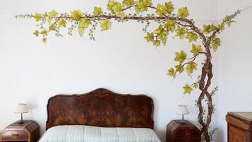 Hypo-allergenic bedding, iron/ironing board, cots/infant beds