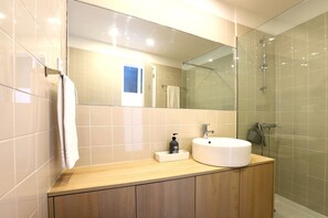 Shower, hair dryer, towels, soap