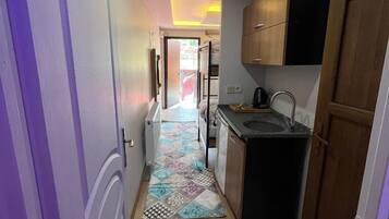 Fridge, microwave, stovetop, cookware/dishes/utensils