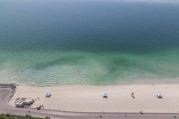 On the beach, sun-loungers, beach towels - Luxury 1 BR Beach Apartment with Full Sea View (Ajman)